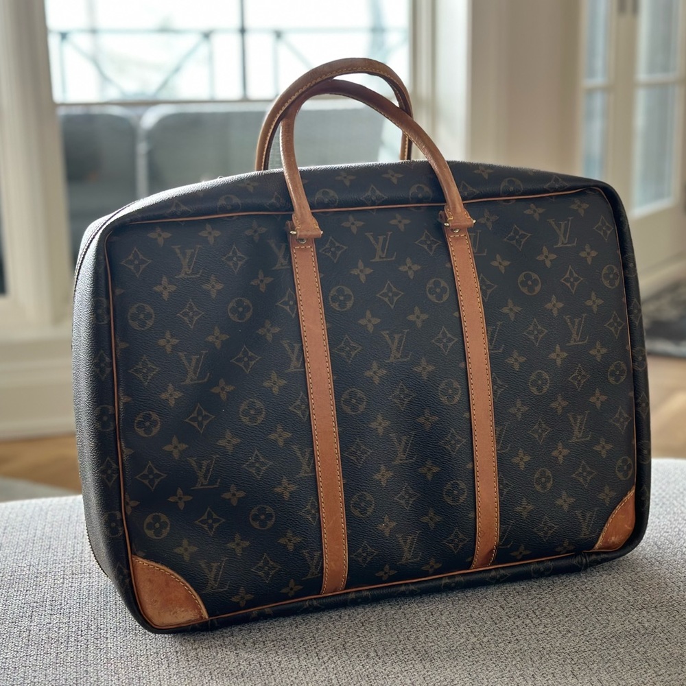 Vintage LOUIS VUITTON
Sirius 45 Travel Bag